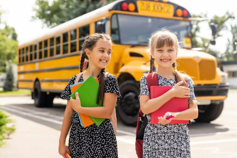 Happy Schoolgirls outdoor. Back to School